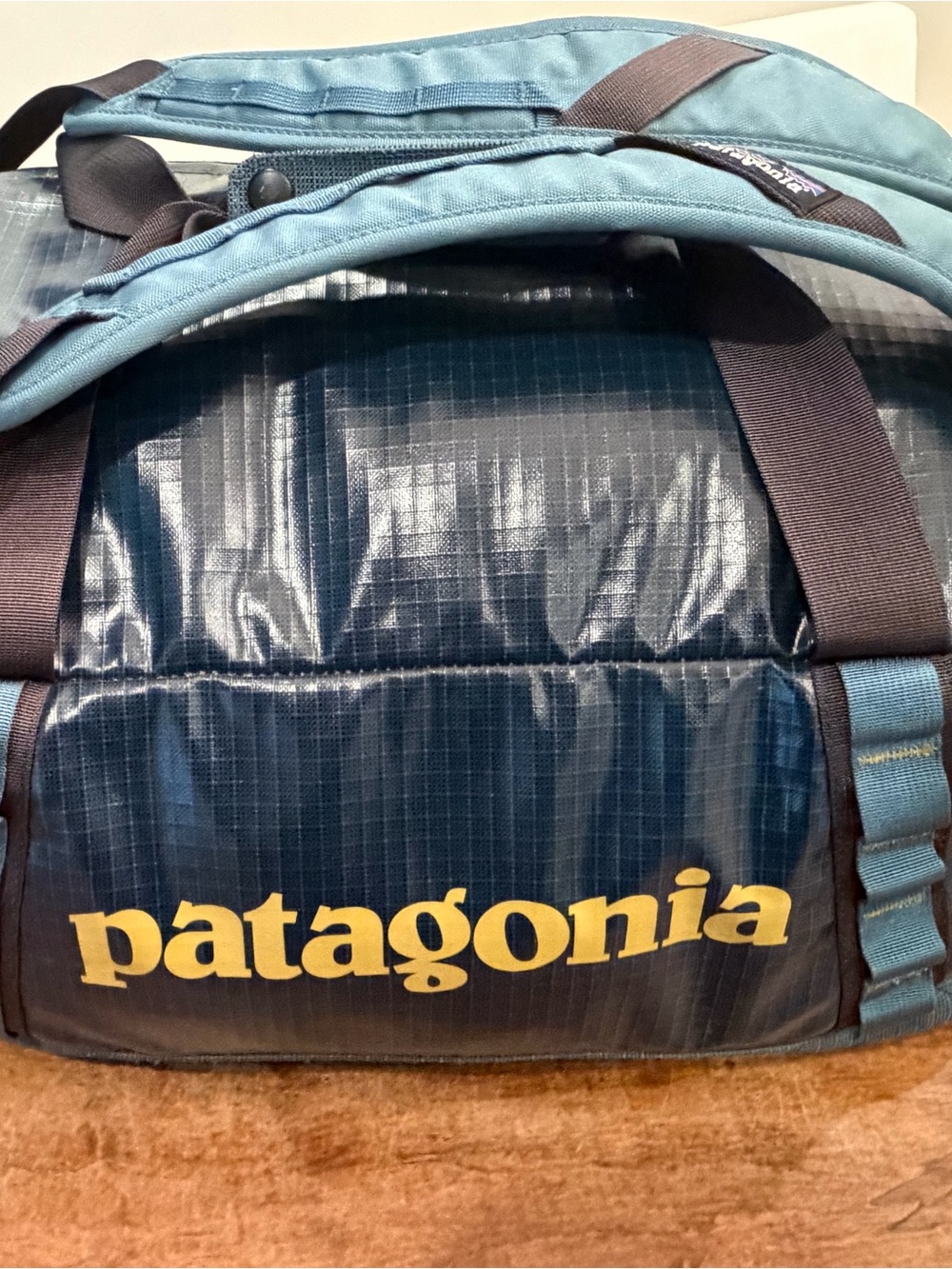 Patagonia Teal & Navy Duffel with Gold Logo
